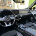 Steering wheel of rent a CLA 45 AMG in Berlin