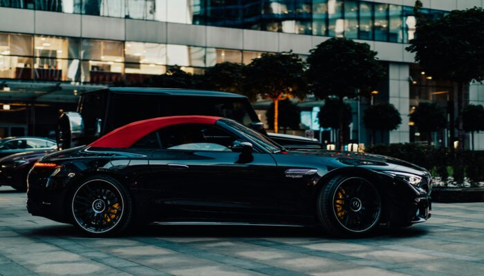 Mercedes SL63 AMG is parking in the street for rent