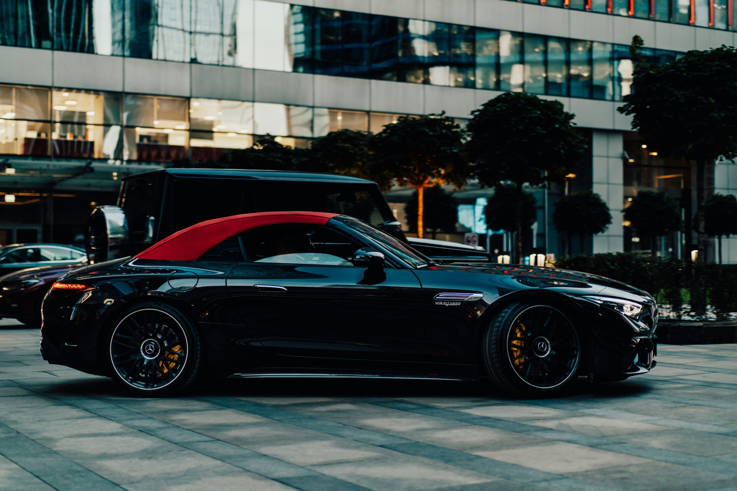 Mercedes SL63 AMG is parking in the street for rent