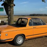 Side View of BMW 2002 Baur Cabrio classic car rental in Munich