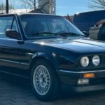 Front View of a BMW 320i Cabrio classic car rental in Munich