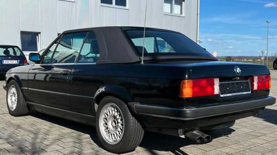 Back View of a BMW 320i Cabrio classic car rental in Munich