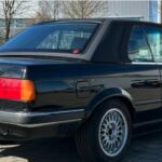 Back View of a BMW 320i Cabrio classic car rental in Munich