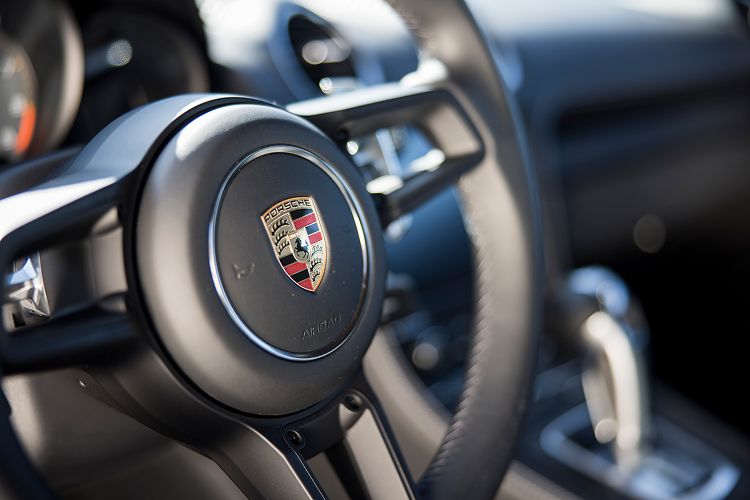 Steering wheel Porsche Cayman GT4 on Lake Constance