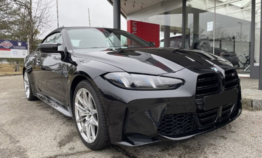 Rent a BMW M4 Competition Convertible near Munich