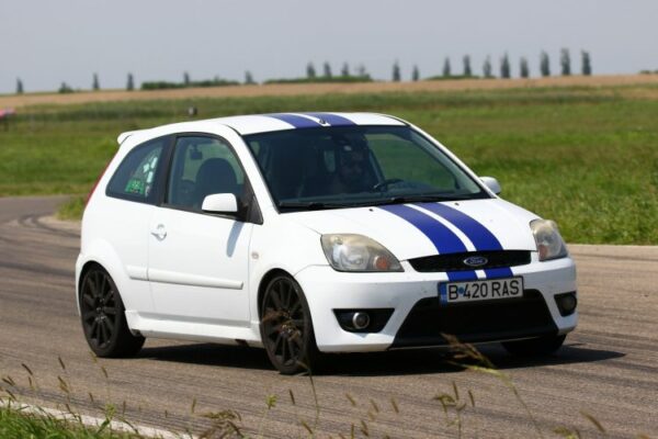 Ford Fiesta drafting on the race track