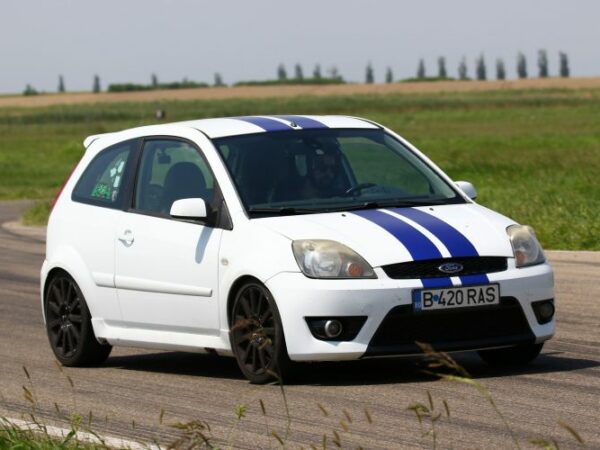 Ford Fiesta drafting on the race track