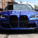 front view driver form BMW M4 Competition in Dortmund