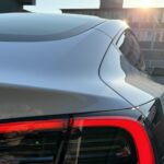 Backlights of rent a Tesla Model 3 in Berlin