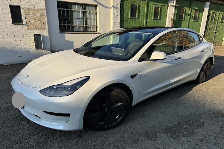 Side of rent a Tesla Model 3 in Berlin