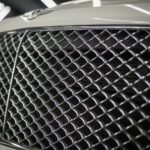 radiator grille of Rent a Bentley Bentayga in Berlin