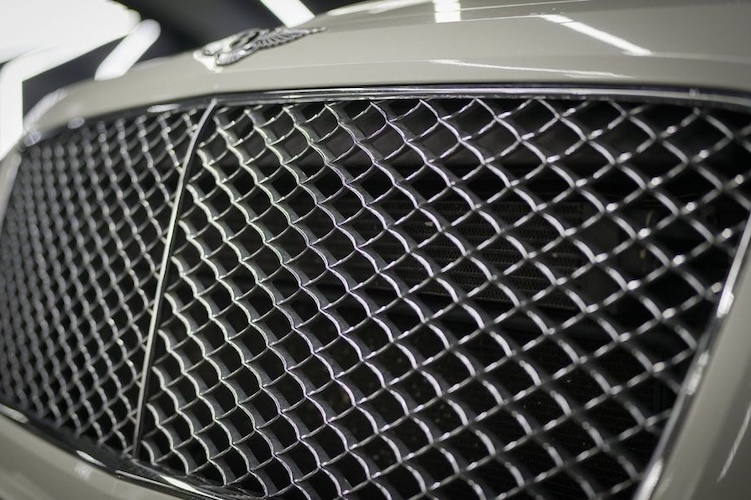 radiator grille of Rent a Bentley Bentayga in Berlin