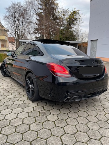 Back side of Rent a Mercedes C63S AMG in Dortmund