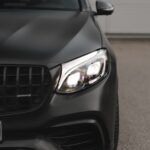 Front lights of Rent a Mercedes GLC63 S AMG in Dortmund