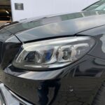 Front lights of Rent a Mercedes C63S AMG in Dortmund