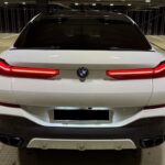 Back View of BMW X6 M60i in Frankfurt