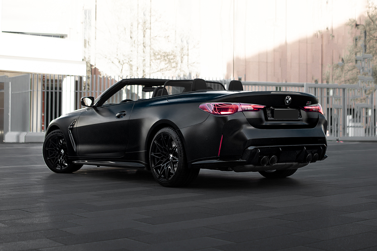 Side view back BMW M4 Competition Convertible in Leverkusen