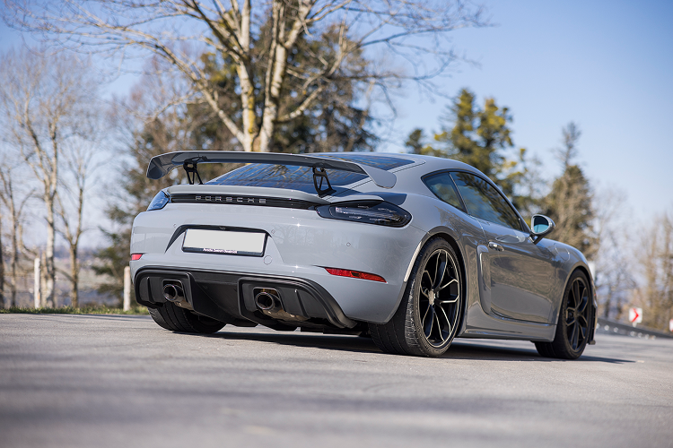 Rear view Porsche Cayman GT4 on Lake Constance