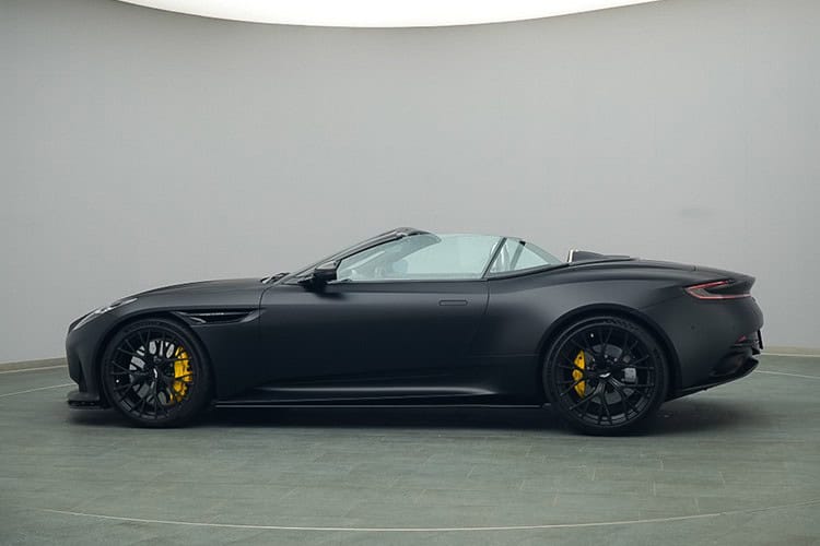 Side view Aston Martin DB12 Volante in the Schwarzwald