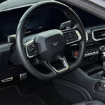 Rent Ford Mustang GT in Potsdam cockpit